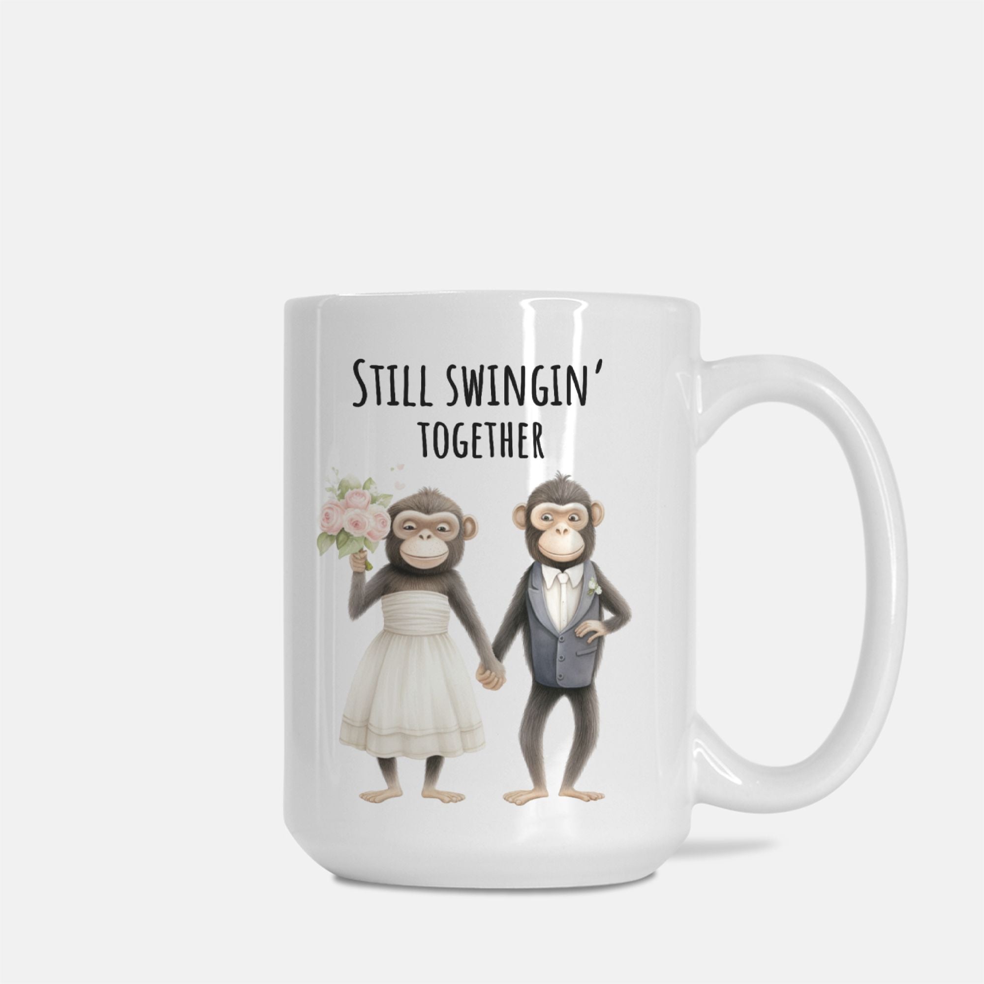 Mug with cartoon monkeys in wedding attire and 'Still Swingin' Together' text on a white background