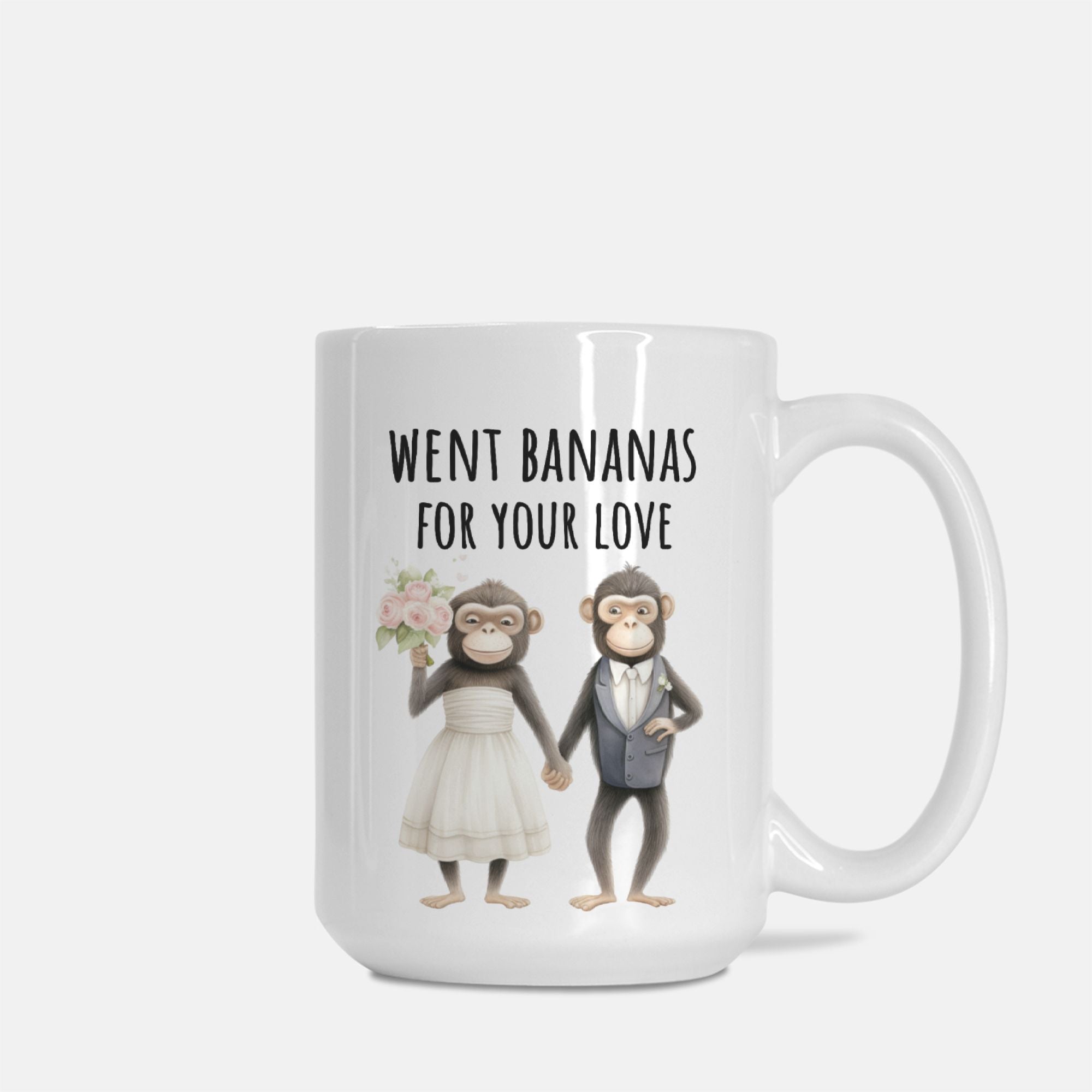 Mug with cartoon monkeys in wedding attire and text 'Went bananas for your love' on a white background