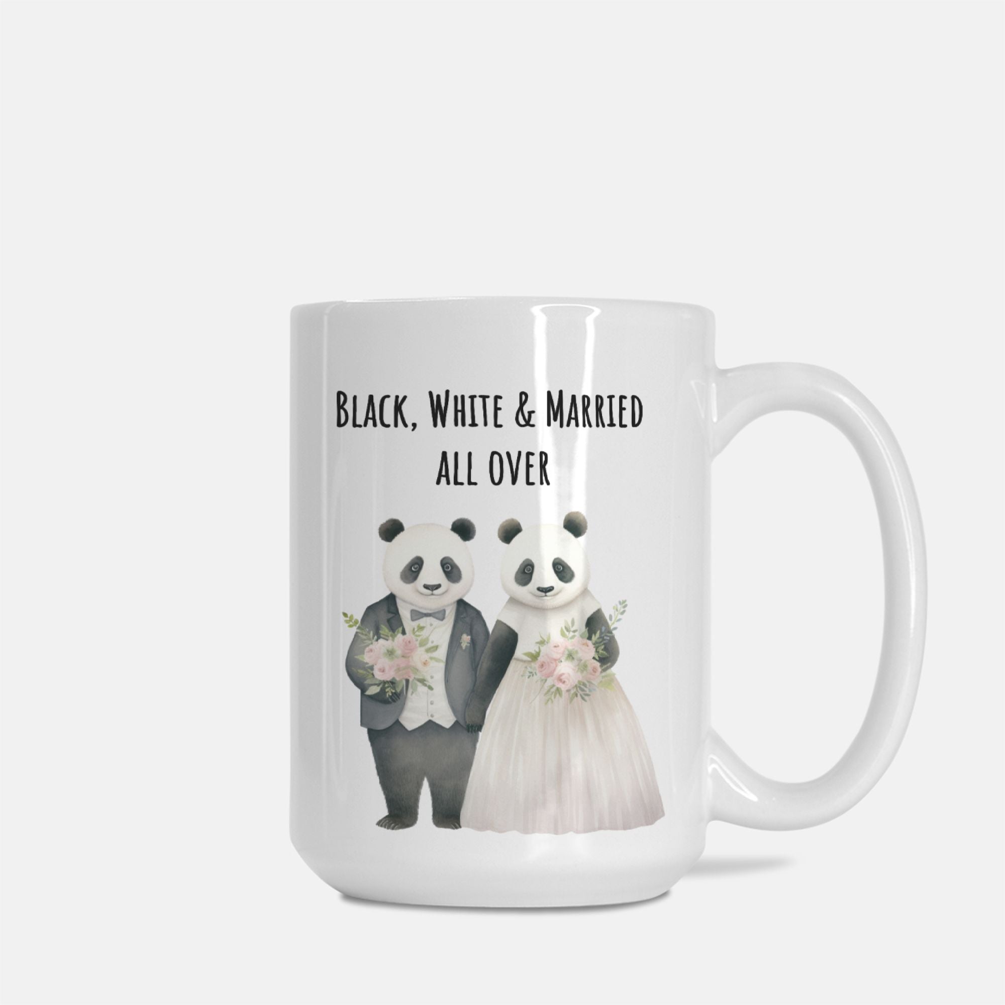 Mug with panda couple design and text 'Black, White & Married All Over' on a white background
