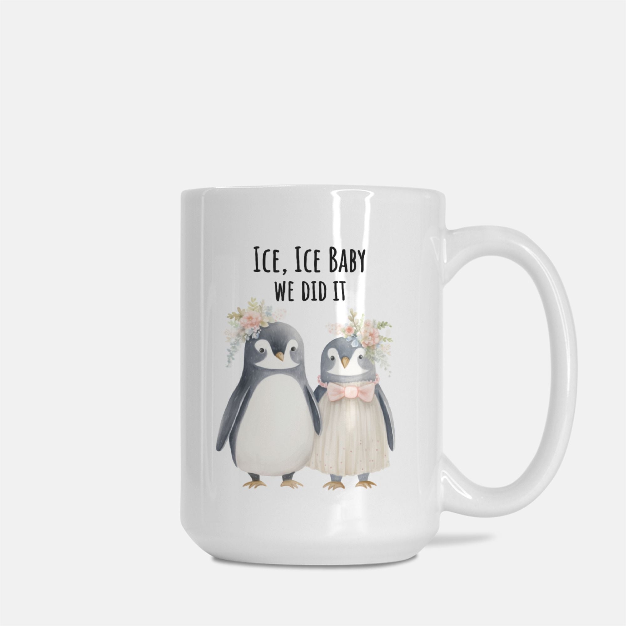 Mug with penguin design and text 'Ice, Ice Baby We Did It' on a white background
