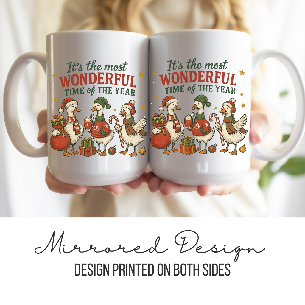 Two white mugs with Christmas design and text held together, showing mirrored design on both sides.